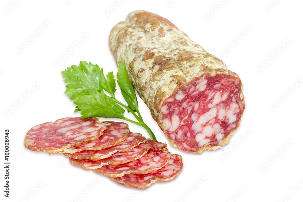 Salami and sprig of parsley on a light background Salami and sprig of parsley on a light background