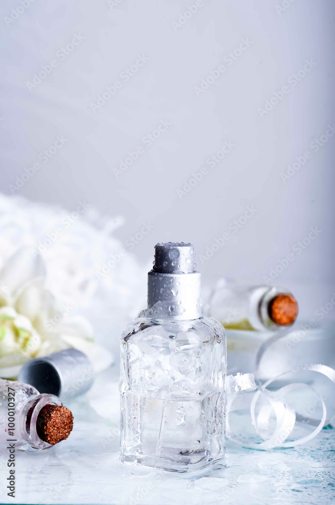 perfume bottles with water backgraund perfume bottles with water backgraund