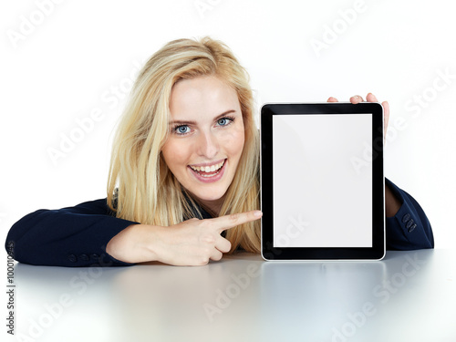 Business woman presenting her tablet pc photo