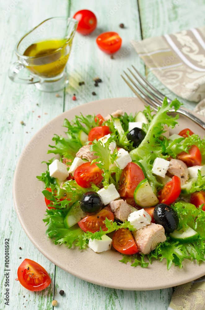 Fresh salad with tuna, tomatoes and cucumbers Fresh salad with tuna, tomatoes and cucumbers