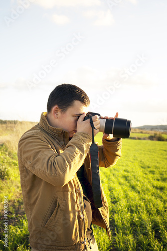 Men take a photo about beautiful landscape