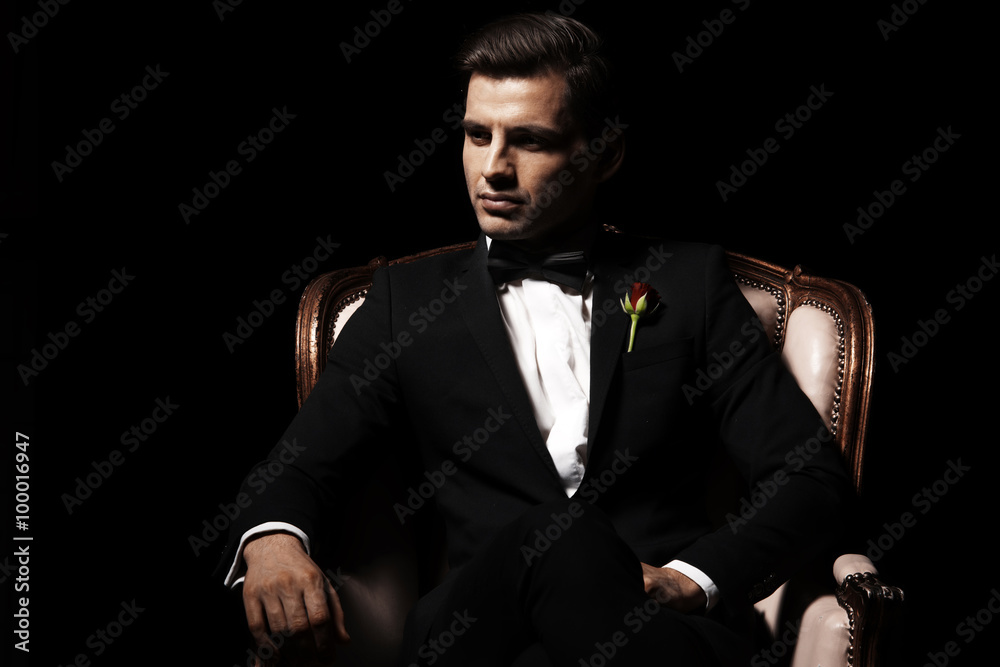 Portrait of man who sitting on chair, godfather-like character. - obrazy, fototapety, plakaty 