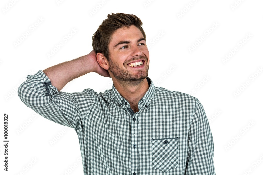 Smiling man with hand behind head Smiling man with hand behind head
