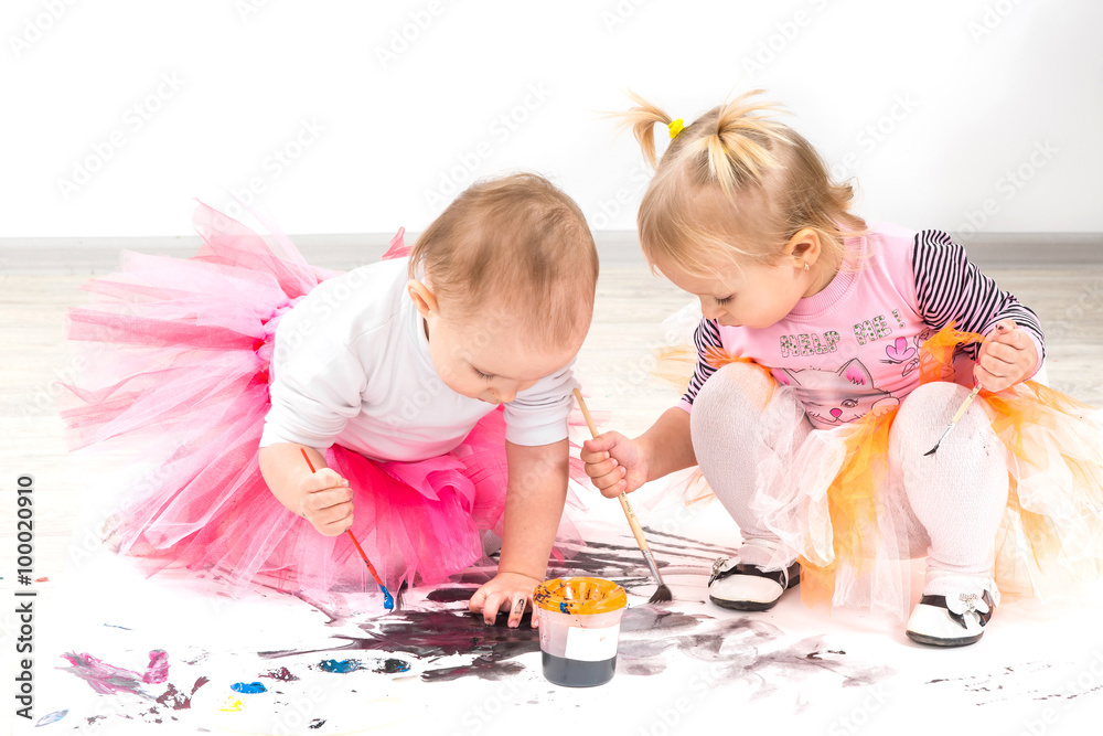Fototapeta premium Children, little girls paint colors