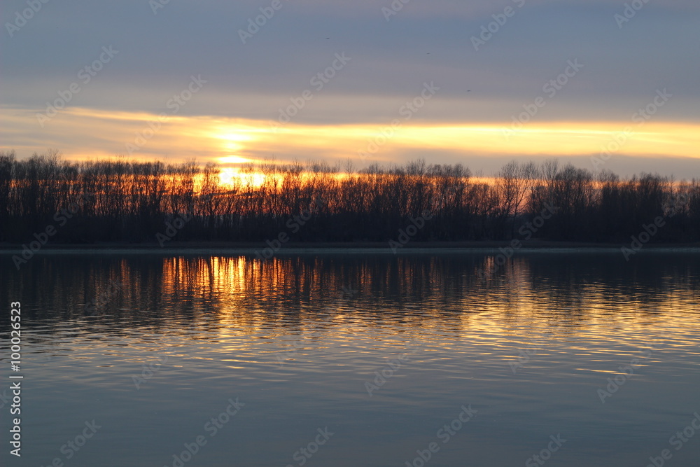 Sunset on the Danube river in winter