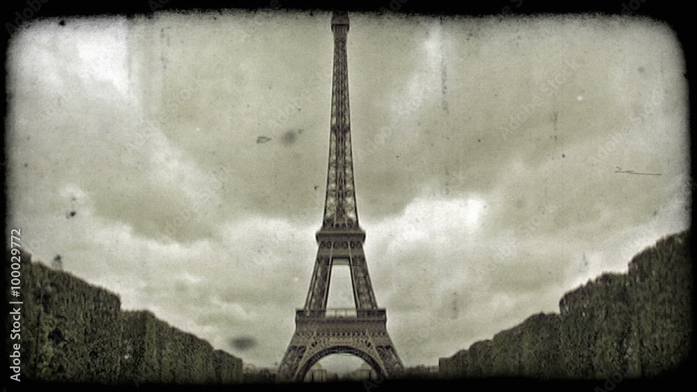Front of Eiffel Tower. Vintage stylized video clip.