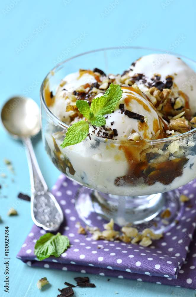 Vanilla ice cream with caramel and walnuts. Vanilla ice cream with caramel and walnuts.