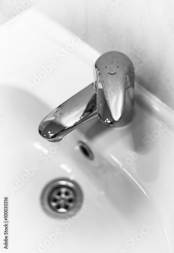 Funny faucet shot close-up in black and white.