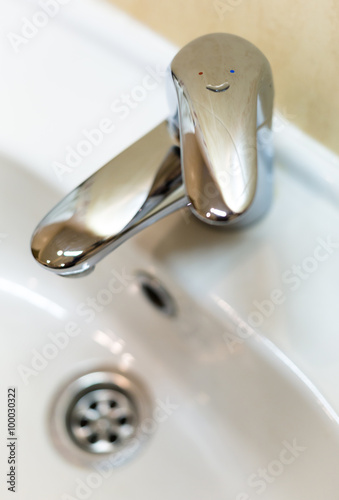 Funny faucet (water trap, valve) close-up shot.