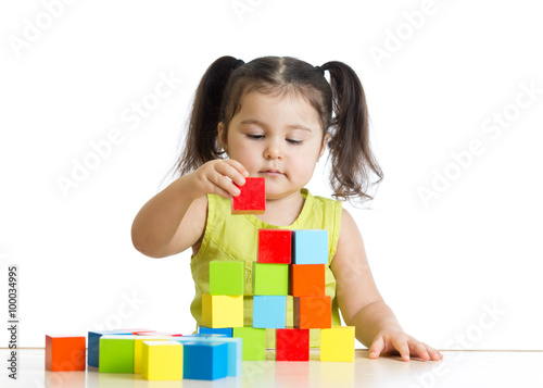 Beautiful child plays build...