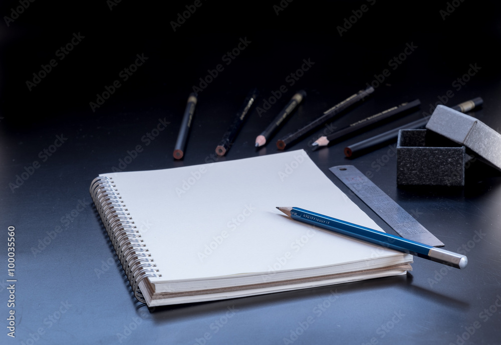 Notepad,pencil,ruler and giftbox on PVCboard black Notepad,pencil,ruler and giftbox on PVCboard black
