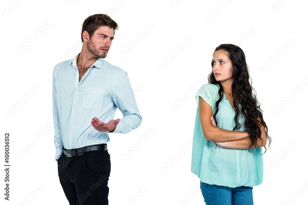 Couple standing back to back while arguing Couple standing back to back while arguing