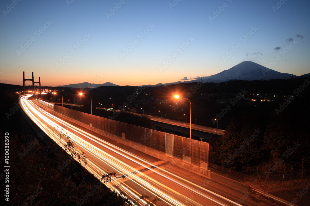 Mount Fuji and highway at sunset.