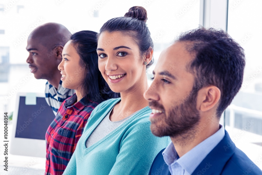 Obraz premium Portrait of businesswoman with colleagues