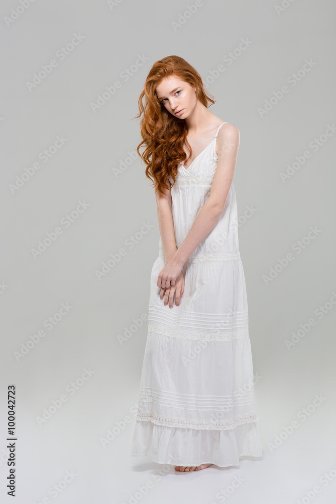 Charming redhead woman in dress Charming redhead woman in dress