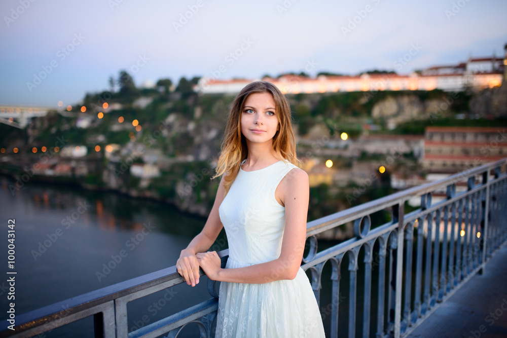 girl standing on the background of Porto