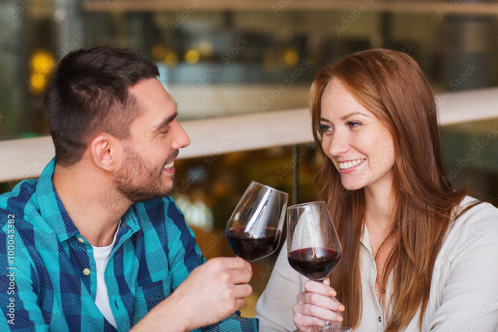 happy couple dining and drink wine at restaurant happy couple dining and drink wine at restaurant