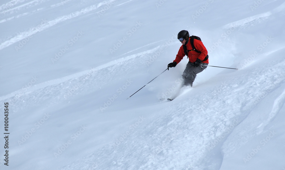 skier in deep powder snow