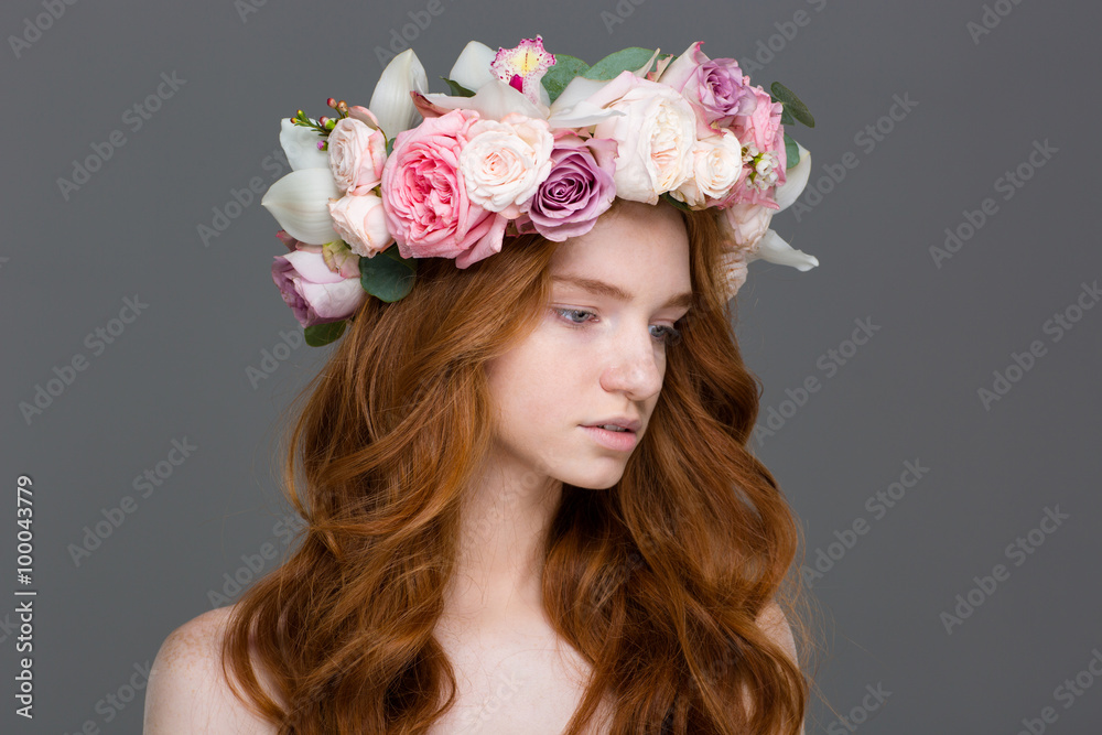 Beautiful tender woman with long hair in wreath of roses Beautiful tender woman with long hair in wreath of roses
