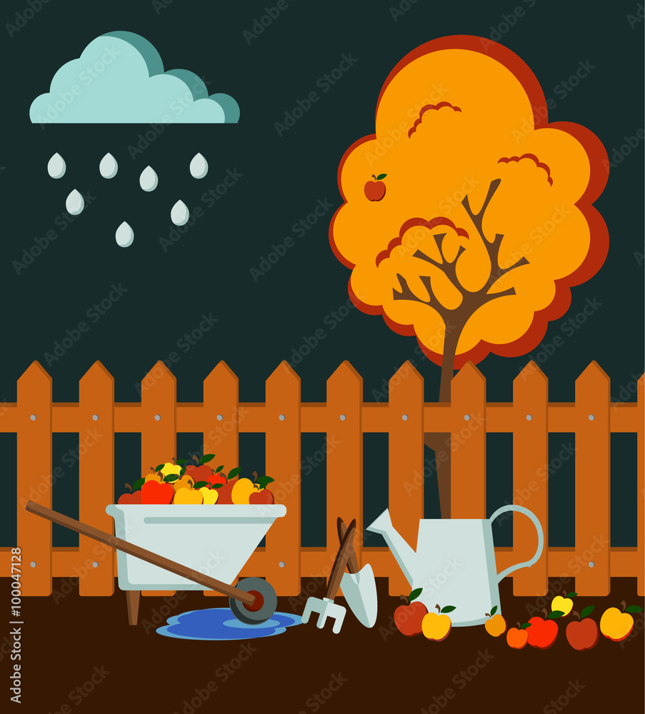 Obraz premium Autumn time garden flat style composition with a brown fence, metal watering can, an apple tree with red fruits, garden tools and a wheelbarrow with apple harvest ; dark sky, rainy.