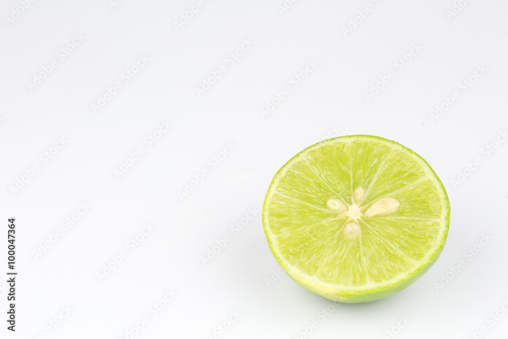 Half of lime on isolated white background