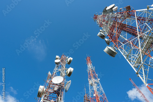 Three big radio mast with blue sky