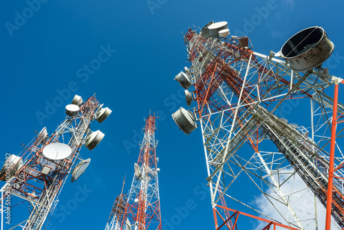 Billede på lærred three big radio mast with blue sky
