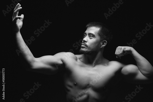 Young asian man with muscular upper body © TeamDaf