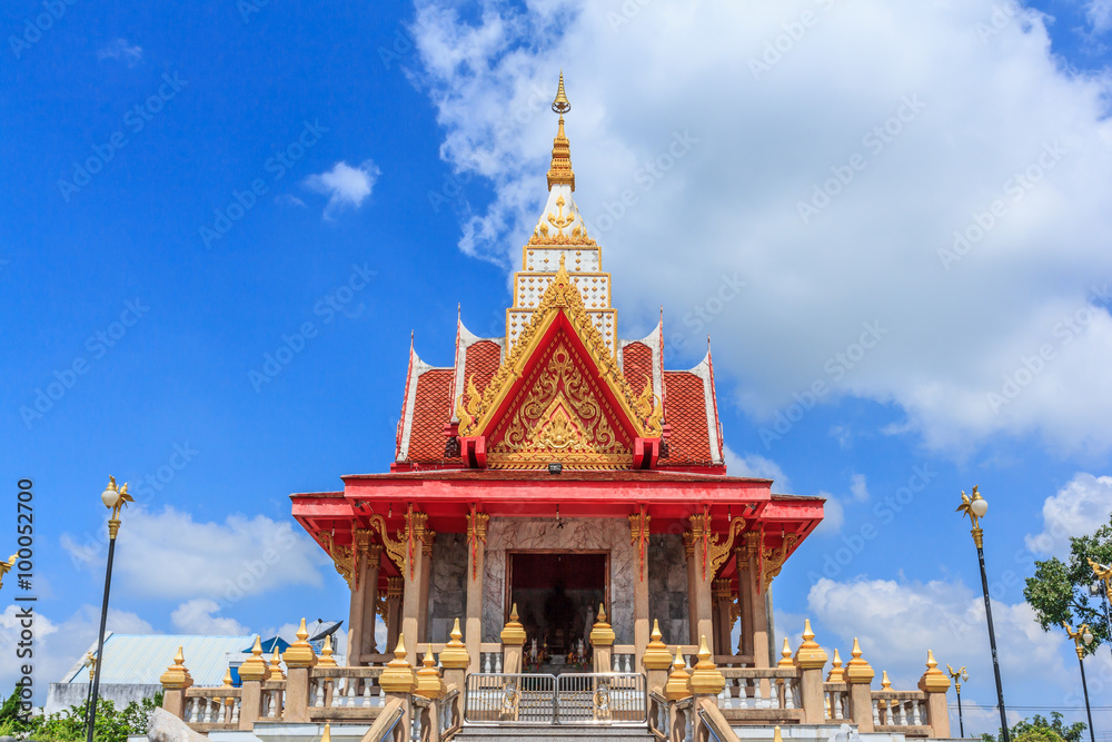 Fototapeta premium red rooftop against blue sky