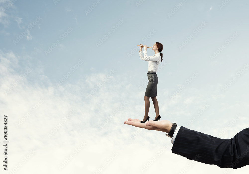 Palm supporting businesswoman Palm supporting businesswoman