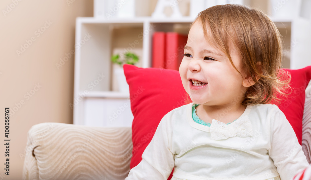 Happy toddler girl smiling in her house Happy toddler girl smiling in her house