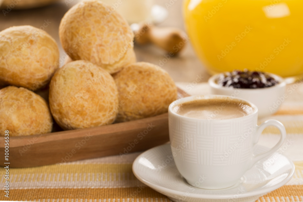 Brazilian cheese buns . Table cafe in the morning with cheese bread. Brazilian cheese buns . Table cafe in the morning with cheese bread.