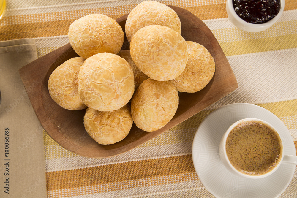 Brazilian cheese buns . Table cafe in the morning with cheese bread. Brazilian cheese buns . Table cafe in the morning with cheese bread.