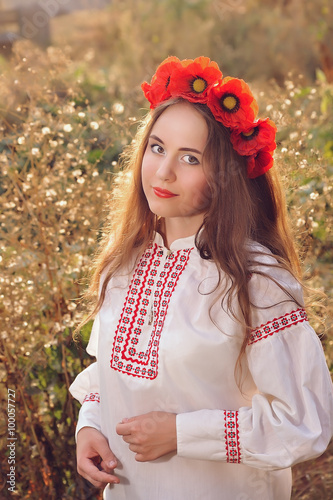 Girl in the Ukrainian national native costume Beautiful Ukrainian girl in the Ukrainian national native costume on Slavic holiday