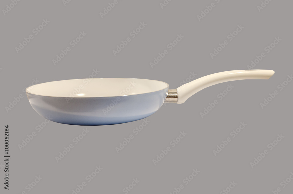 Frying pan isolated on grey background Frying pan isolated on grey background