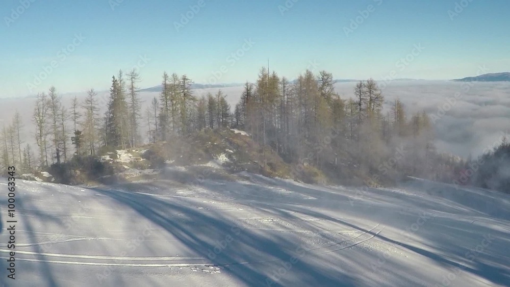 Snow cannon in action at ski slope landscape. Snow cannon in action at ski slope landscape.