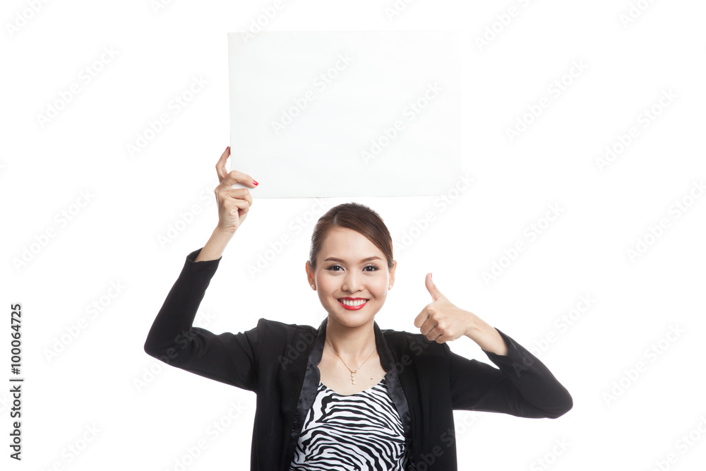 Young Asian business woman show thumbs up with white blank sign Young Asian business woman show thumbs up with white blank sign