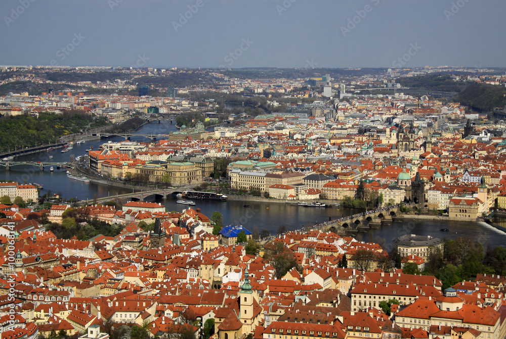 PRAGUE, CZECH REPUBLIC - APRIL 24, 2013: The aerial view of Prague City and  Charles Bridge from Petrin Hill