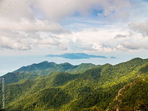 The top of Mount Gunung Mat Cincang in Langkawi, Malaysia, the second highest mountain on the island. A real tropical island view north over the Andaman Sea and Koh Tarutao in Thailand.
