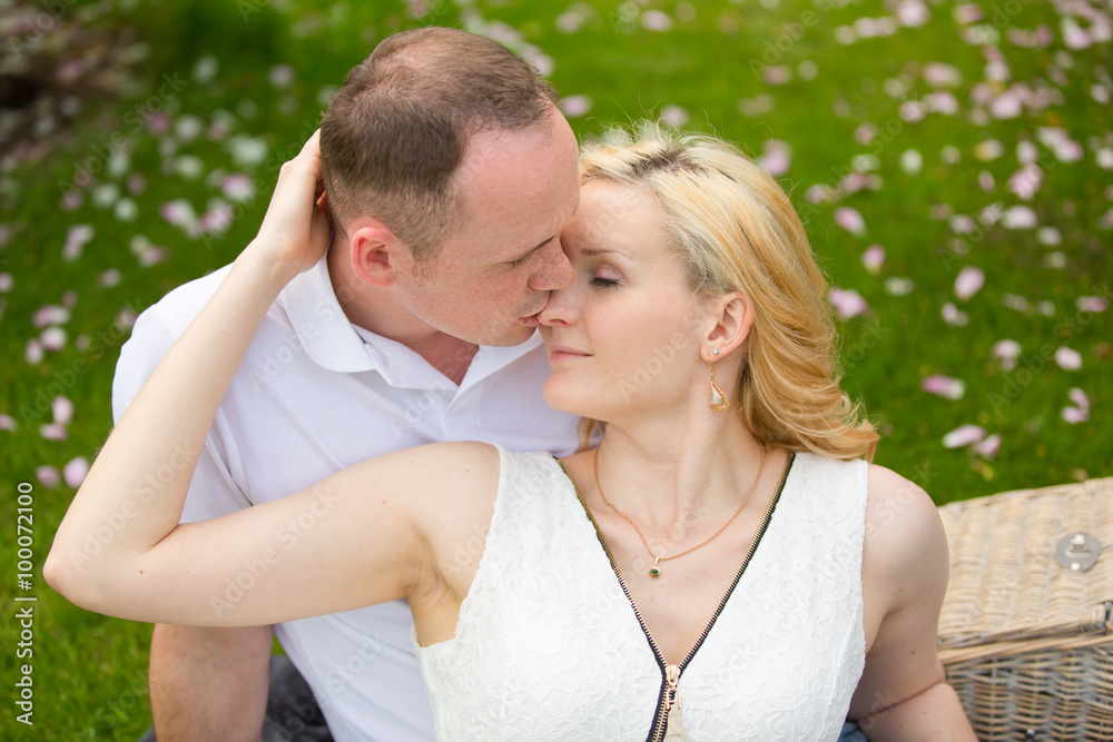 Fototapeta premium Lovely couple embraces outdoors