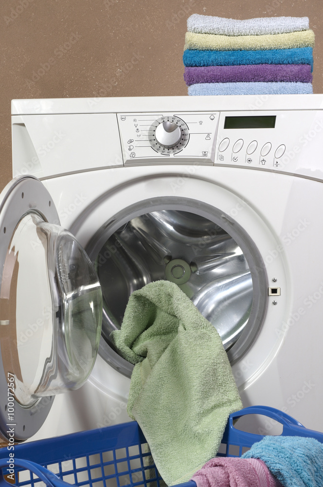 Clothes inside of washing machine taken closeup Clothes inside of washing machine taken closeup