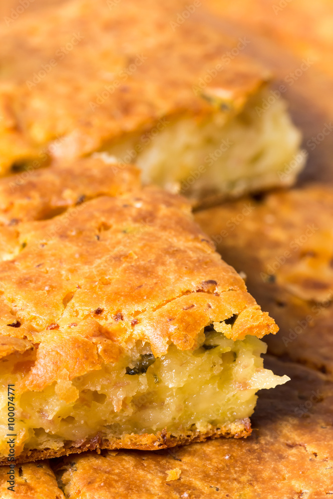 Macro view of homemade pie with ham cheese and cucumber Macro view of homemade pie with ham cheese and cucumber