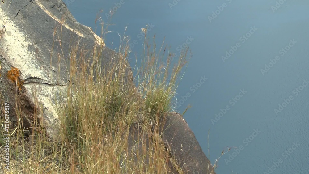 Landscape: stone, grass, the prospect of distant islands, Therasia, Greece.
Landscape: stone, grass, the prospect of distant islands, Therasia, Greece.