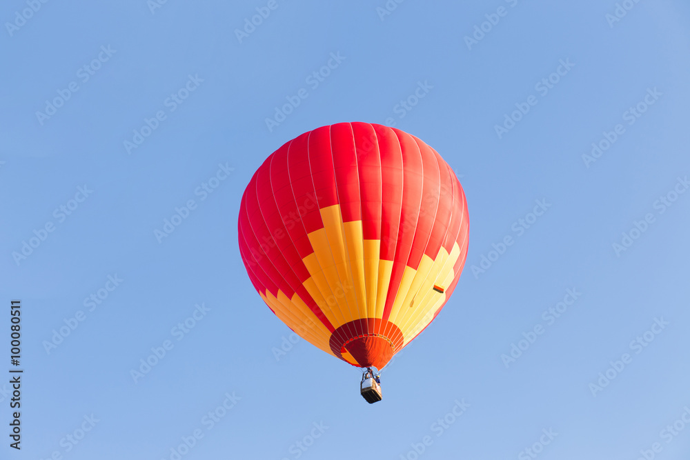 Red hot air balloon on blue sky Red hot air balloon on blue sky