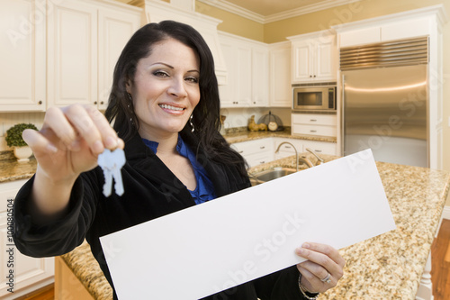 Hispanic Woman In Kitchen H...