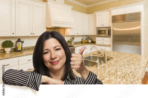 Hispanic Woman with Thumbs ...