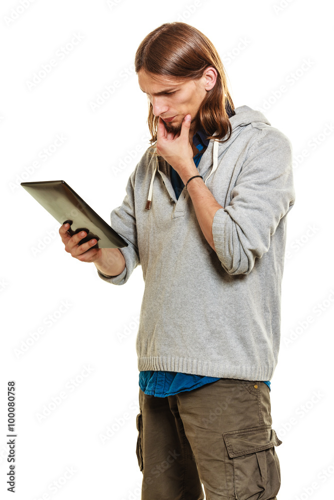 Fashion man using pc tablet browsing internet. Fashion man using pc tablet browsing internet.