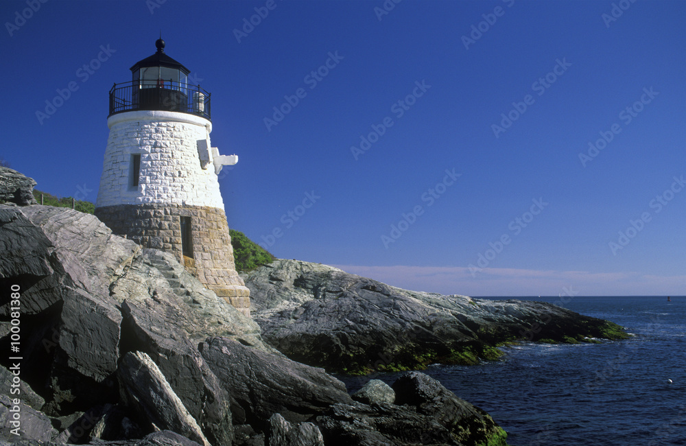 Historic Castle Hill lighthouse is constructed on a rocky ledge near Newport, Rhode Island,