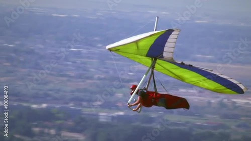 Hang glider is soaring over the South Salt Lake valley in UT. photo