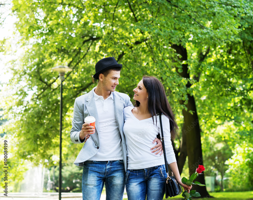 Lovely couple on a romantic date in a park Lovely couple on a romantic date in a park